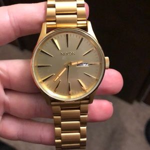 Nixon gold men’s watch with links